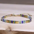 Handgemaakte retro Tila kralenarmband met gouden en blauwe accenten voor dames - Blauw Groen Wit Goud Tila Stijl (Tila 27)