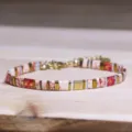 Etnische vintage Tila-kralenarmband handgemaakt met rode en witte marmerpatronen - Rood Wit Goud Tila Stijl (Tila 28)