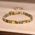 Bracelet bohème en perles Tila fait main aux tons naturels avec des intercalaires dorés - Style Vintage Tons Terre (Tila 11) / Multicolore/Tons Terre