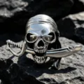 Viking gothic pirate skull ring in polished stainless steel for men with biting cutlass detail - US Size 7 / Silver Gray