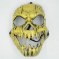 Detailed view of the yellow and black Halloween skull mask, featuring sharp teeth design. - Gold Evil Full Face Skull Mask