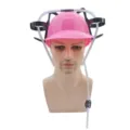 Vue détaillée du casque de boisson rose fantaisie avec porte-gobelets et paille de fête. - Casque à boisson rose