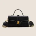 Borsa a tracolla da donna in pelle nera con cinghia larga, elegante e casual - Nero