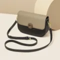 Borsa a tracolla da donna in pelle, design bicolore, elegante borsa a sella con cinghia regolabile. - Nero