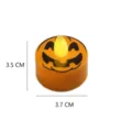 Close-up detail of the mini Halloween pumpkin LED tealight candle, showing glowing design. - 3.5*3.7cm Orange Pumpkin Candle 1 Piece