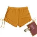 Detail view of women solid yellow mesh high waist drawstring swim shorts beach bikini bottoms. - Turmeric