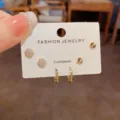 Detailed view of minimalist rhinestone square earrings and hoop set on display card. - Zirconia Square Hoop Set / Thickened Real Gold Plated / Gold