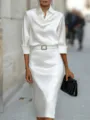 Elegant white satin long sleeve blouse and skirt detail showing smooth fabric and belt buckle. - S / White