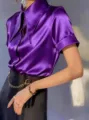Elegant purple satin short-sleeve shirt detail, showcasing smooth fabric and sleek collar design. - S / Purple