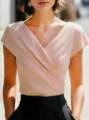 Elegant cross v-neck short sleeve top in soft pink, featuring a slim fit and stylish drape. - S / Pink