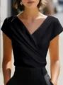 Detailed view of the elegant black crossover V-neck short sleeve women top fashion style. - S / Black