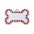 Placa de identificacion para mascotas en forma de hueso plateada con estrases rojos. - 4x2.7cm / Rojo