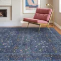 Detail view of the vintage bohemian floral area rug with blue botanical pattern in room. - 40*60cm (Faux Cashmere + Washable Base) / RZMM-Floral (1)