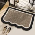Non-slip absorbent bathroom door mat with chic scalloped border and modern woven design. - Xu Yun Wavy Shape Dark Brown YM-4719