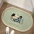 Green plaid bath mat with cute cat embroidery and inspiring English quote for home decor. - Plaid Cat Oval Green