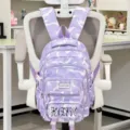 Purple camo backpack for women large capacity student school bag casual travel rucksack detail - Purple