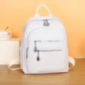 Stylish white PU leather backpack for women, multi-pocket casual school daypack bag. - Off White