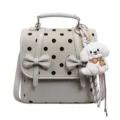 Korean style polka dot backpack cute bow school bag casual commuting daypack for women. - With Pendant / Off White