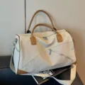Grand sac de voyage de grande capacite en toile pour femmes, elegante bandouliere sport. - Blanc Cassé