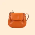 Orange leather crossbody saddle bag for women, stylish minimalist daily shoulder bag. - Brown
