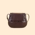 Stylish dark brown faux leather saddle bag for women, elegant daily shoulder crossbody purse. - Coffee