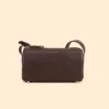 Minimalist brown leather barrel bag, compact shoulder and crossbody style for daily commute. - Coffee