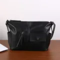 Black genuine leather shoulder bag for men and women, stylish minimalist crossbody bag. - Black