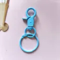 Blauw gelakte snoepkleur karabijnhaak sleutelhanger hardware accessoire detail weergave - Blauwe wartelmusketon & 30 mm sleutelring