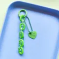 Detailed view of the jelly green acrylic chain keychain and lovely heart pendant for bags. - Green Heart Chain