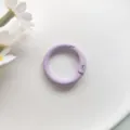 Detail view of the light purple metal spring ring, perfect for bags and keychains. - Light Purple