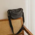 Black genuine leather crossbody bag, minimalist dumpling bag with wide strap for women. - Black