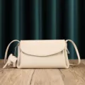 Genuine leather women crossbody bag soft cowhide shoulder bag apricot cloud bag with cute elephant charm - Milk White