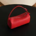 Red cylindrical leather shoulder bag, stylish casual barrel crossbody bag variant item. - Bright Red