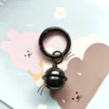 Black metal spring ring keychain with cute bell pendant, minimalist bag charm accessory. - Black Spring Clasp with 18mm Bell and Open Jump Ring