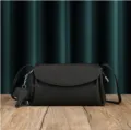 Black soft leather crossbody bag, stylish casual shoulder bag with cute elephant charm accessory. - Black