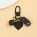 Porte-clés cœur en alliage noir avec cloche et chaîne, accessoire élégant pour sac. - Noir