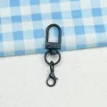 Close-up detail of black metal swivel lobster clasp keychain accessory for DIY bags. - Black Gate Clasp & Lobster Clasp