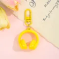 Candy color 3D headphone keychain, cute creative bag pendant and stylish accessory charm. - Headphone with Buckle / Yellow