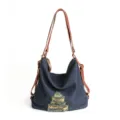 Dark blue denim multi-way shoulder bag with brown leather straps, casual large capacity tote. - Blue