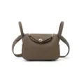 Mini Lindy leather crossbody bag taupe color top handle pillbox bag with gold hardware variant - Lindy 19 - Khaki