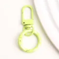 Groene legering sleutelhanger veerring accessoire voor DIY tassenhanger detailweergave - Groene donut veerringslot en karabijnsluiting