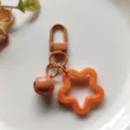 Oranje acryl holle ster sleutelhanger met bel, schattige DIY tas bedel hanger accessoire. - Oranje veersluiting met 14 mm belletje en ster