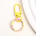 Gele donut sleutelhanger veerring legering hanger DIY tas telefoonketting accessoire - Gele donut veerringslot en karabijnsluiting