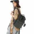 Sac à dos de voyage en nylon compact avec une poche avant à carreaux et une mini-pochette. - Noir
