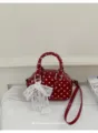 Rote Handtasche mit Punkten fuer Damen, schicke Umhaengetasche mit wundershoener Schleife. - Rot