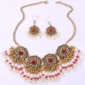 Bohemian vintage gold-tone necklace and earrings set with red stones and white pearls detail - Red