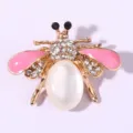 Rhinestone bee brooch, cute insect design with pink enamel wings and pearl body for suit pin. - Pink