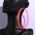 Neon orange acrylic oversized hoop earring detail, modern streetwear bold accessory close-up shot - Rose Red