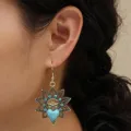 Vintage bronze dangle earrings featuring blue rhinestones, owl motif and turquoise heart. - Antique Gold