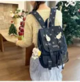 Korean style vintage denim backpack with star pattern and cute plush dog pendant. - Blue With Pendant